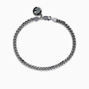 The 925 Mens Sterling Silver Curb Chain Link Bracelet features a lobster clasp and a small, round yin-yang charm, displayed on a white background.