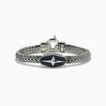 The 925 Sterling Silver and Black Spinel Braided Chain Bracelet features an oval clasp with a star design adorned with black spinels and a round spring ring closure.