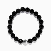 The Tiger's Eye and Onyx Beaded 2-Piece Bracelet Set with Sterling Silver features brown and black beads, each bracelet accented by a single sterling silver bead with a textured, woven pattern for an elegant stacked look.