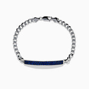 The Mens 925 Sterling Silver Chain Link Blue Sapphire Bracelet features a rectangular bar centerpiece adorned with blue sapphires, showcased elegantly on a white background.