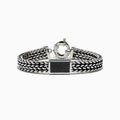 The Men's 925 Sterling Silver Black Spinel Chain-Link Bracelet features black and silver woven links, a rectangular clasp accented with black spinel stones, and a round spring-ring closure at the top.