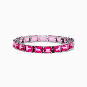The 925 Sterling Silver Pink Topaz Tennis Bracelet features vibrant rectangular pink topaz gemstones set in individual prongs, forming a continuous elegant line.