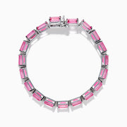 The 925 Sterling Silver Pink Topaz Tennis Bracelet features vibrant rectangular pink topaz gemstones set in individual prongs, forming a continuous elegant line.
