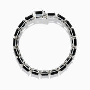 The 925 Sterling Silver Onyx Tennis Bracelet features rectangular black onyx stones in a sleek silver link design, shown on a white background—an elegant accessory for any occasion.