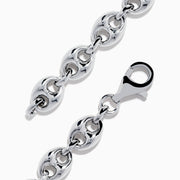 The Mens 925 Sterling Silver Puffed Mariner Link Chain Bracelet features oval links and a lobster clasp, displayed in a circular shape on a white background.