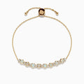 The Aurora 14K Yellow Gold Opal Bolo Bracelet 1.81 TCW features eight opal stones in a row, a sliding clasp, and gold bead accents for a delicate, elegant look.