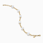 The 14K Fresh Water Pearl Station Bracelet features evenly spaced round fresh water pearls set in 14K gold, shown on a plain white background.