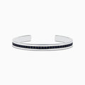 A sleek Mens 925 Sterling Silver Black Sapphire Cuff Bangle (4.09 TCW) features a single row of dark sapphires along the center, an open-ended design, polished finish, and modern appeal.