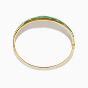 The 14K Yellow Gold Malachite and Diamond Inlay Bangle features green malachite with diamond accents in a leaf-inspired pattern for an elegant, eye-catching look.