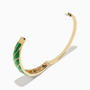 The 14K Yellow Gold Malachite and Diamond Inlay Bangle features green malachite with diamond accents in a leaf-inspired pattern for an elegant, eye-catching look.