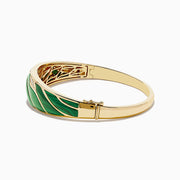 The 14K Yellow Gold Malachite and Diamond Inlay Bangle features green malachite with diamond accents in a leaf-inspired pattern for an elegant, eye-catching look.
