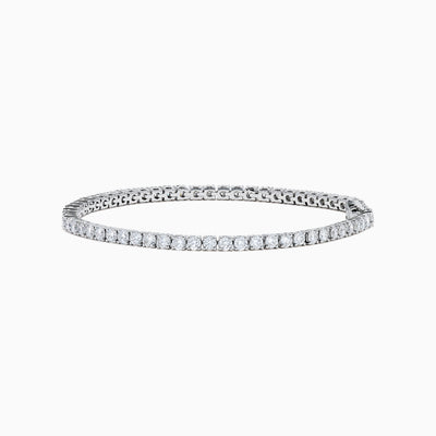 The Lab Grown Round Diamond 5.00ct Tennis Bracelet in 14K White Gold, featuring a single row of sparkling diamonds, is displayed against a plain white background.