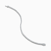 The Lab Grown Round Diamond 5.00ct Tennis Bracelet in 14K White Gold, featuring a single row of sparkling diamonds, is displayed against a plain white background.