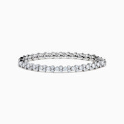 The Lab Grown Round Diamond 7.00ct Tennis Bracelet in 14K White Gold showcases a single row of prong-set, sparkling lab grown diamonds against a white background.