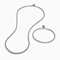 The Mens 925 Sterling Silver Minimalist Necklace and Bracelet Set is displayed on a white background, featuring a classic link design with round clasps.