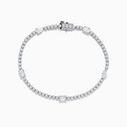 The Lab Grown Diamond Tennis Bracelet in 14K White Gold features a row of round and marquise-cut stones set in a continuous line, creating an elegant and timeless look.