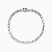 The Lab Grown Emerald Cut Diamond 4.26ct Tennis Bracelet in 14K White Gold features a single row of lab grown diamonds, set in a sleek white gold band and showcased on a plain white background.