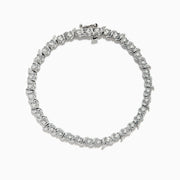 The 925 Silver Diamond Tennis Bracelet showcases a continuous line of sparkling diamond accents in prong settings, secured with a clasp and beautifully displayed against a white background.