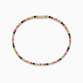 The Watercolors 14K Yellow Gold Multi Sapphire Tennis Bracelet features a single row of small, round, multicolored sapphires in a repeating pattern, displayed on a white background.