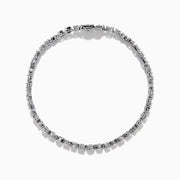 The 14K White Gold Fancy Cut Diamond Miracle Set Bracelet features alternating oval, pear, and emerald-cut diamonds in a continuous pattern against a white gold background.