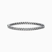 The Pave Classica 14K White Gold Diamond Tennis Bracelet features 0.87 TCW of sparkling diamonds in a sleek, elegant design that adds timeless sophistication to any look.