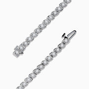 The Pave Classica 14K White Gold Diamond Tennis Bracelet features 0.87 TCW of sparkling diamonds in a sleek, elegant design that adds timeless sophistication to any look.