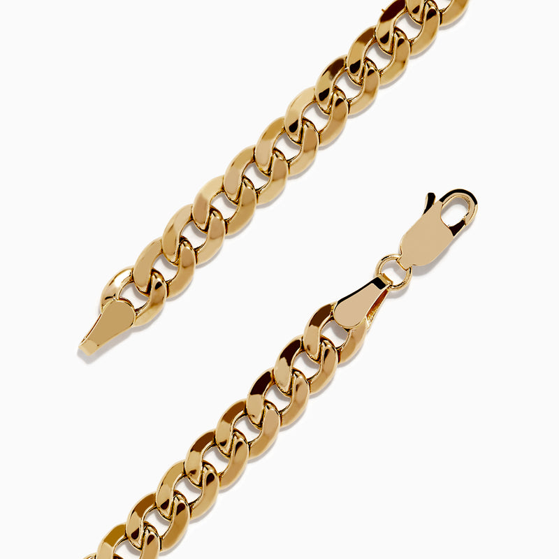 The Mens 14K Yellow Gold Black and White Diamond Evil Eye Chain Bracelet 8.75 displays an eye-shaped charm set with black and white diamonds, shown on a plain white background.