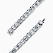 The 18K White Gold Diamond Tennis Bracelet features a continuous row of square-cut diamonds in an elegant design set against a white background.
