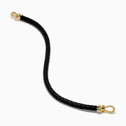 The Men's 14K Yellow Gold Diamond Accented Horseshoe Leather Bracelet features black braided leather and a gold, diamond-accented horseshoe clasp, shown against a plain white background.
