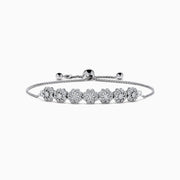 The 925 Sterling Silver Diamond Bouquet Bolo Bracelet features sparkling flower-shaped diamond clusters and an adjustable sliding clasp for a perfect fit.