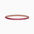 A slim 14k rose gold tennis bracelet featuring oval pink tourmalines and rubies totaling 6.56 TCW, set in a single row and displayed on a white background.
