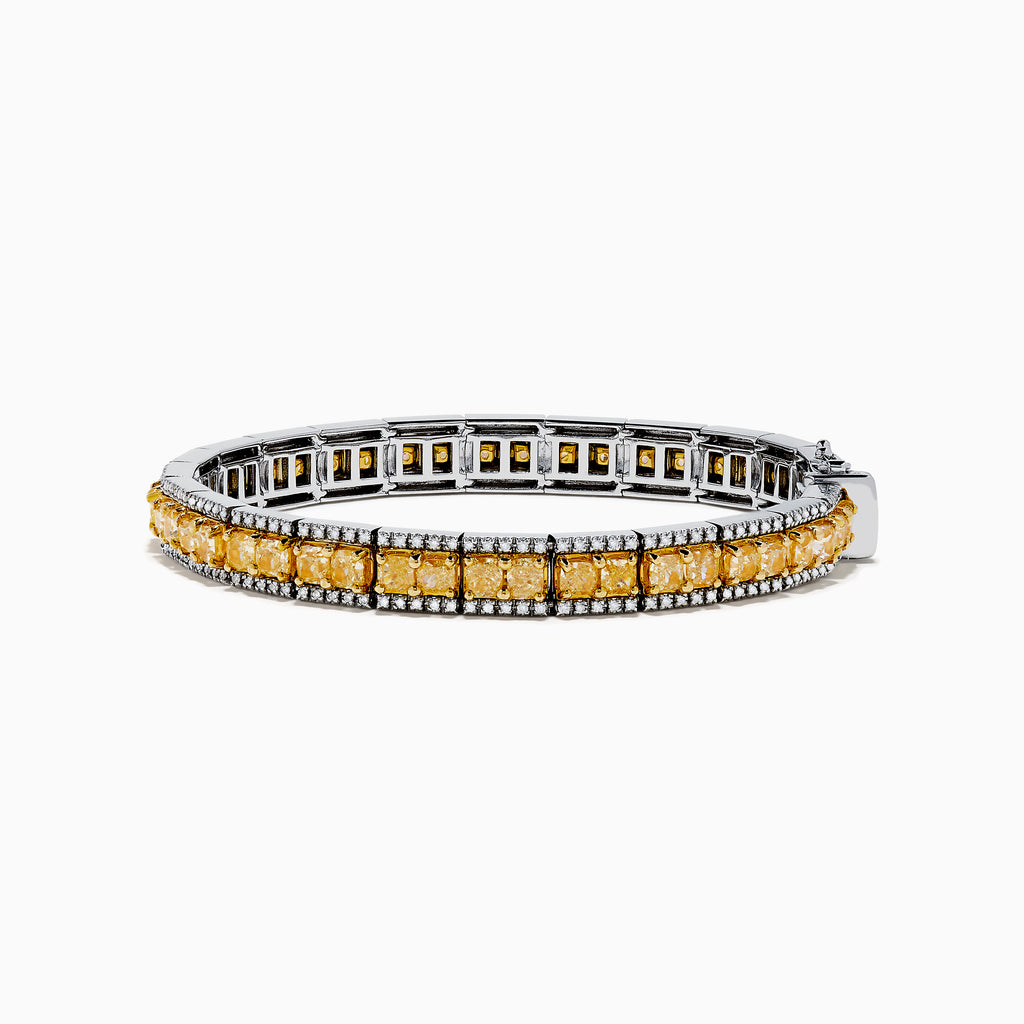 The Canare 14K White and Yellow Gold Yellow and White Diamond Bracelet features a row of yellow diamonds framed by white diamonds, set in elegant white and yellow gold.