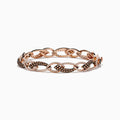 The 14K Rose Gold Espresso and White Diamond Tennis Bracelet 3.33 TCW features alternating links encrusted with sparkling espresso and white diamonds, creating an elegant, shimmering pattern against a rose gold setting.