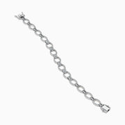 The 14K White Gold Diamond Oval Chain-Link Bracelet showcases a modern and elegant design, featuring alternating smooth and diamond-encrusted oval links, displayed on a white background.