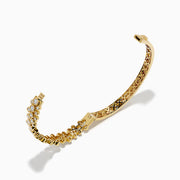 The Lab Grown Round Diamond 2.88ct Bubble Bangle in 14K Yellow Gold features clustered round diamonds and an intricate open lattice inner design.