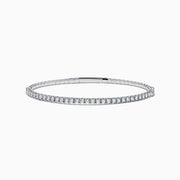 The Pave Classica 14K White Gold Diamond Bangle 1.45 TCW features a slim white gold design with a continuous row of sparkling diamonds, elegantly displayed against a plain white background.
