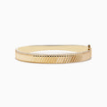 Mens 14K yellow gold diamond bangle, 0.51 TCW, features a ridged diagonal pattern and a delicate row of small diamonds along the top edge, shown on a white background.