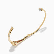 The Signature 14K Gold Multi Sapphire and Diamond Panther Bangle features a panther head clasp adorned with multi sapphire gemstones and a circular diamond-set ring.