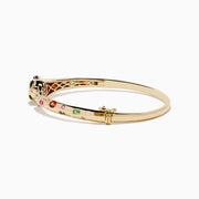 The Signature 14K Gold Multi Sapphire and Diamond Panther Bangle features a panther head clasp adorned with multi sapphire gemstones and a circular diamond-set ring.