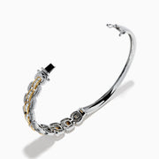 Introducing the 14K Two Tone Diamond Chain-Link Bangle: a refined bracelet crafted with alternating gold and silver rectangular links, each embellished with delicate diamonds for an elegant, luxurious look against a white background.