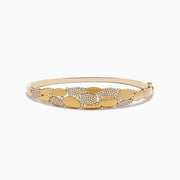 The 14K Yellow Gold Pave Diamond Bangle features alternating smooth gold and pavé diamond oval segments, shown on a white background.