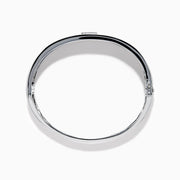 The Sterling Silver Pavé Blue Sapphire and Diamond Anchor Bangle features a small anchor design at the center, encrusted with blue sapphires and diamonds, shown against a plain white background.