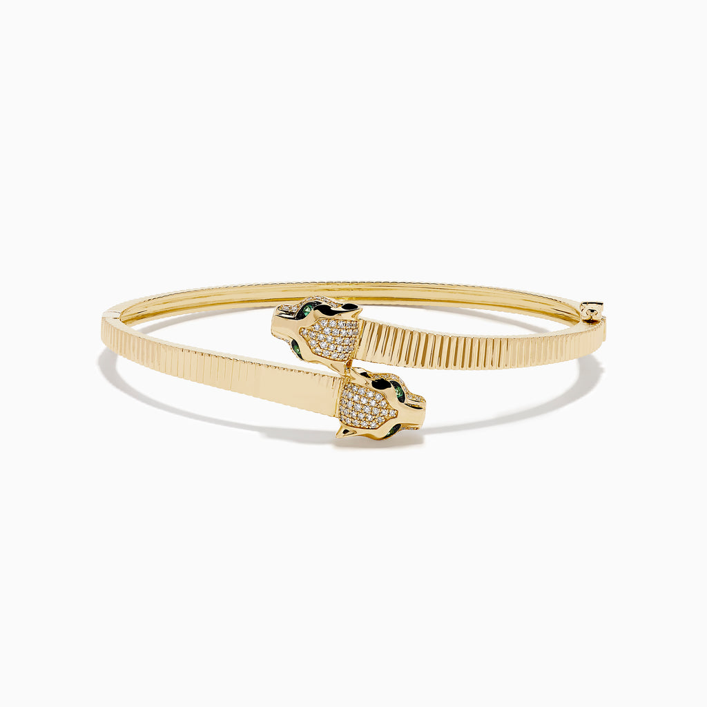 The Signature 14K YGold Diamond and Emerald Panther Bypass Bangle features twin panther heads with emerald eyes, diamond accents, and a textured ribbed band for a distinct, elegant look.