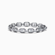 The Classique 14K White Gold Diamond Bracelet features interlocking H-shaped links and is adorned with sparkling diamonds, offering a polished, luxurious look.