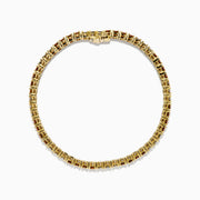 The Espresso 14K Yellow Gold Brown and White Diamond Tennis Bracelet features a single row of alternating brown and white diamonds, showcased against a plain white background.