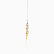 The Aurora 14K Yellow Gold Opal and Diamond Pendant features a teardrop opal encircled by sparkling diamonds on a delicate gold chain.