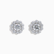 The Star Lab Grown Diamond Fleur Stud Earrings feature a central round diamond with a floral halo of smaller diamonds, beautifully set in 18K white gold for a timeless look.