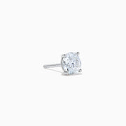 The Star Lab Grown Diamond Stud Earrings in 18K White Gold feature round lab diamonds in classic prong settings, elegantly displayed against a plain white background.