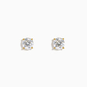 The Star Lab Grown Diamond Stud Earrings in 18K Yellow Gold feature round lab diamonds set in yellow gold prongs, shown against a plain white background.