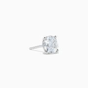 The Star Lab Grown Diamond Stud Earrings feature round, clear lab diamonds set in elegant four-prong 18K white gold settings, shown on a white background.